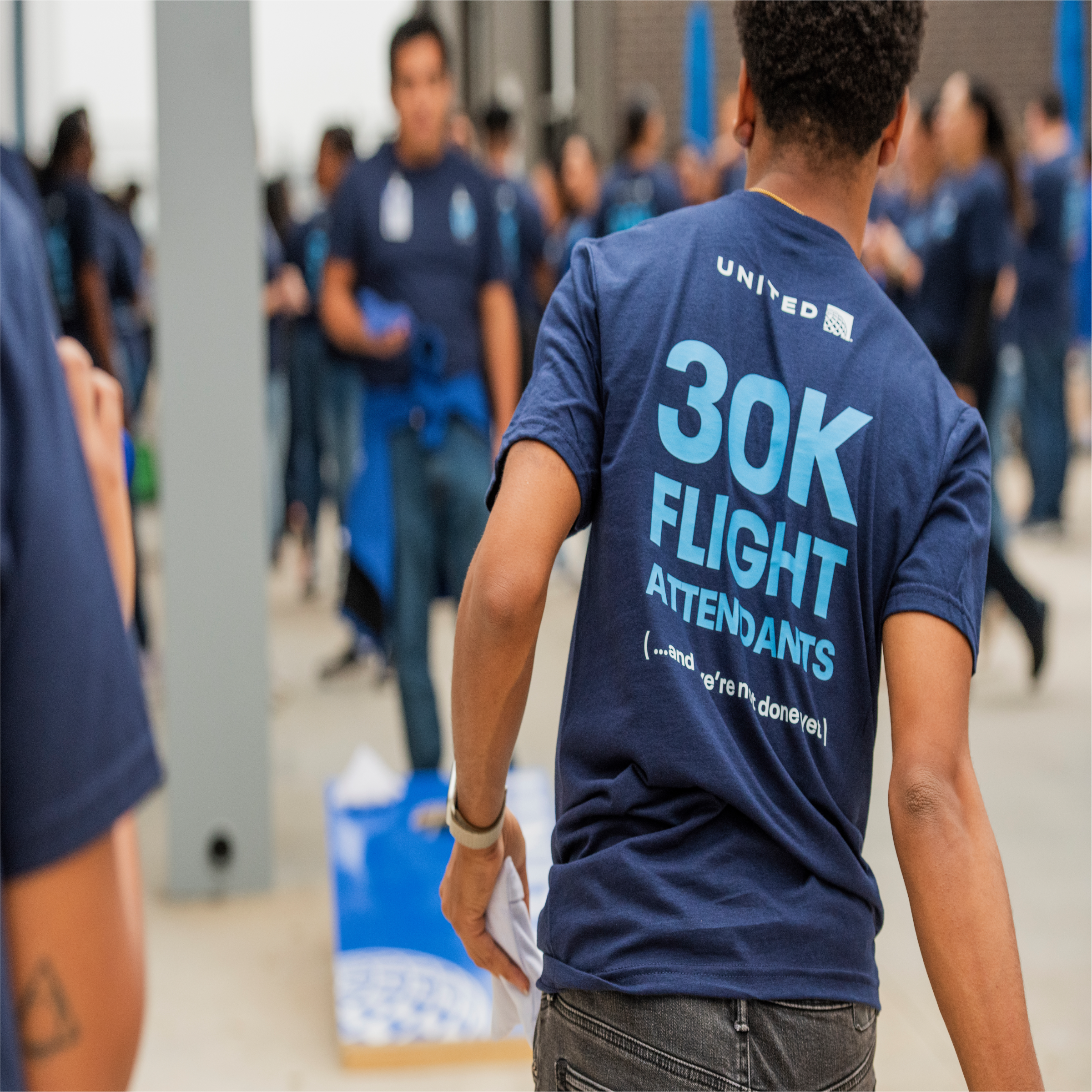 United people wearing 30k flight attendants tees